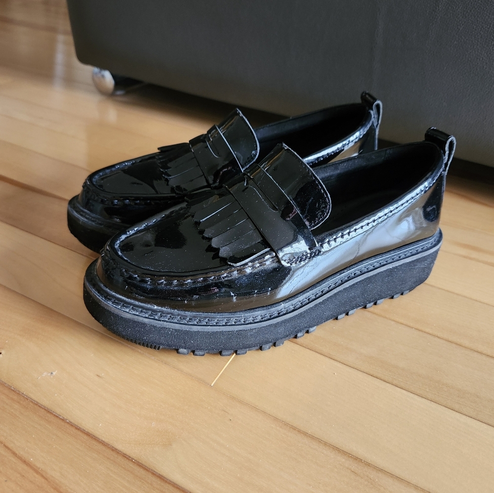 Clarks Black Platform Loafers with Fringe